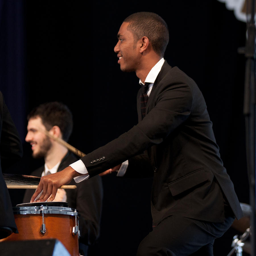 Jonathan Batiste plays a drum