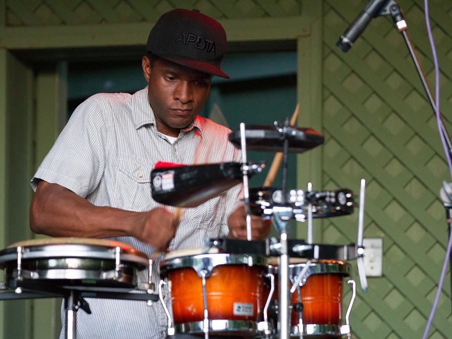 Dwayne Muhammad on percussion