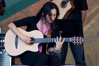 Gabriela Quintero on acoustic guitar