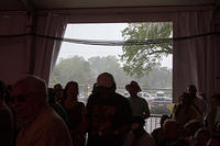 Rain pours outside the tent
