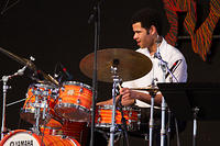 Miles Labat on drums