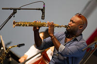 Khari Allen Lee on saxophone
