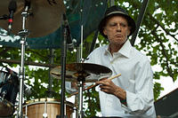 Johnny Vidacovich on drums