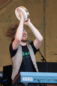 Michael Girardot with tamborine