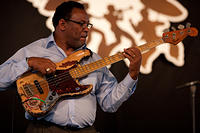 Millard Green on bass guitar