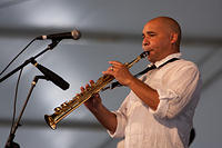 Derek Douget on soprano saxophone