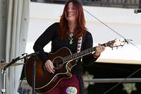 Ruby Rendrag on guitar