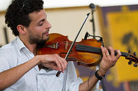 Eric Rodriguez on violin